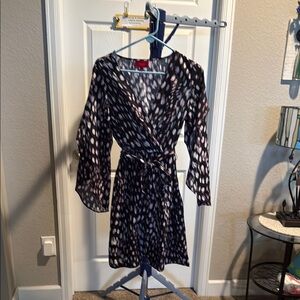 Jennifer Lopez Black and White V-Neck with Bell sleeves Dress. Size M